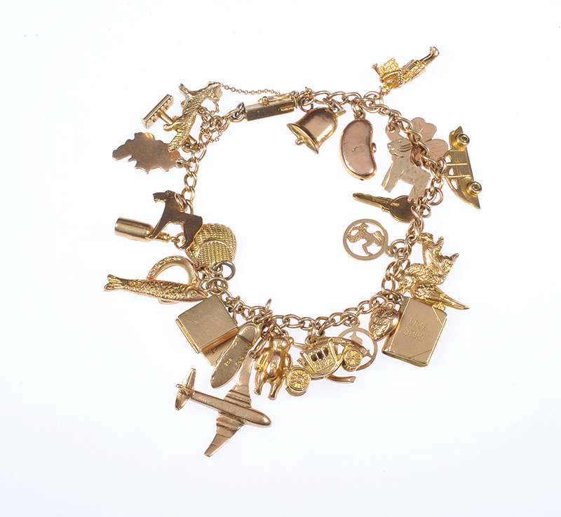 Sold at Auction: Sit Down for This - 9ct Gold Charm Bracelet (20 Charms)  239.2 Grams