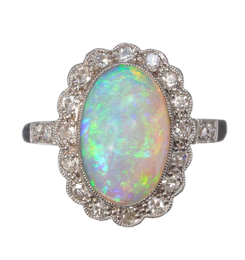 18CT WHITE GOLD AND PLATINUM OPAL AND DIAMOND RING
