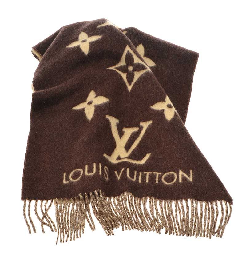 LOT:320  LOUIS VUITTON - a brown cashmere shawl.