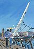 COUPLE CROSSING THE PEACE BRIDGE, DERRY by Sean Lorinyenko at Ross's Online Art Auctions